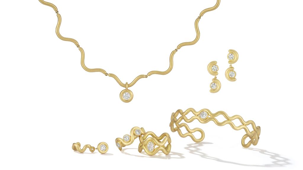 The “Flow” collection from Ashley Thorne consists of, clockwise from top, the 18-karat yellow gold “Yemaya” necklace ($18,250 retail), the “Nadi” earrings ($14,890), the “Kem” bracelet ($16,500), the “Sati” ring ($11,250), the “Ana Pana” ring ($10,650) and the single “Rhy” huggie ($4,975). 20220714_Ashley Thorne group.jpg